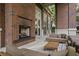 Cozy outdoor lounge area featuring a fireplace and comfortable seating, ideal for relaxing and entertaining at 1820 Peachtree Nw St # 1110, Atlanta, GA 30309