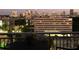 Panoramic evening skyline views from the balcony offer a stunning backdrop for relaxation and entertainment at 1820 Peachtree Nw St # 1110, Atlanta, GA 30309
