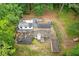 An aerial view of the home featuring deck and patio at 1909 Moores Mill Nw Rd, Atlanta, GA 30318