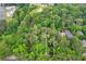 A tranquil aerial view showing boundaries of a wooded property at 1909 Moores Mill Nw Rd, Atlanta, GA 30318