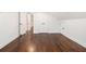 Finished attic space features hardwood floors, white walls and trim, plus closet and attic access at 1909 Moores Mill Nw Rd, Atlanta, GA 30318
