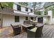 Deck featuring an outdoor seating area and built-in grill at 1909 Moores Mill Nw Rd, Atlanta, GA 30318