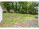 A spacious backyard, perfect for gardening, play and relaxation, with mature trees providing ample shade at 1909 Moores Mill Nw Rd, Atlanta, GA 30318