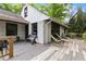 Exterior elevation showcasing deck with chairs at 1909 Moores Mill Nw Rd, Atlanta, GA 30318