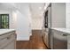 Kitchen with stainless steel appliances and hardwood floors at 1909 Moores Mill Nw Rd, Atlanta, GA 30318