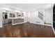 Open living space connects kitchen with hardwood floors and updated appliances at 1909 Moores Mill Nw Rd, Atlanta, GA 30318