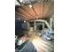 Unfinished basement with exposed ceiling, ductwork, and concrete walls offering potential for customization at 2037 Lakewood Trl Se, Atlanta, GA 30315