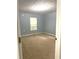 Comfortable bedroom with neutral paint, carpet flooring, and natural light at 2037 Lakewood Trl Se, Atlanta, GA 30315