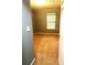 Inviting bedroom with neutral paint, carpet flooring, and natural light at 2037 Lakewood Trl Se, Atlanta, GA 30315