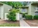 Inviting townhouse with a charming balcony, well-maintained landscaping, and a freshly painted exterior at 2638 Stoney Creek Rd, Marietta, GA 30067