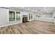 Spacious living room features a cozy fireplace, ample natural light, and hardwood floors at 2638 Stoney Creek Rd, Marietta, GA 30067
