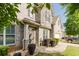 Beautiful home exterior featuring a gray brick facade, well-kept landscaping, and a welcoming front entrance at 3241 Alhambra Cir, Hampton, GA 30228