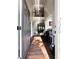Inviting foyer with gleaming wood floors, soaring ceilings, and an elegant staircase leading to the upper level at 3241 Alhambra Cir, Hampton, GA 30228
