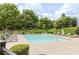 Community pool area with lounge chairs at 3241 Alhambra Cir, Hampton, GA 30228