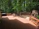 Large backyard area features an outdoor grill and fireplace with seating at 1045 River Pt, Suwanee, GA 30024