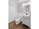 Clean bathroom with a modern vanity and fixtures, and fresh white wall panelling at 1045 River Pt, Suwanee, GA 30024