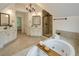 Spacious bathroom with walk in shower, bathtub, and double vanity sinks at 1045 River Pt, Suwanee, GA 30024