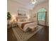 Spacious bedroom with vaulted ceiling, natural light, and hardwood floors at 1045 River Pt, Suwanee, GA 30024