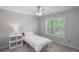 Cozy bedroom with a bed and a window at 1045 River Pt, Suwanee, GA 30024
