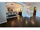 Elegant dining room featuring hardwood floors, a modern chandelier, and stylish decor at 1045 River Pt, Suwanee, GA 30024
