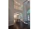 Bright, open-concept dining room with hardwood floors, adjacent to the kitchen at 1045 River Pt, Suwanee, GA 30024