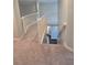 Open upstairs hallway with white railings and a view of the lower level at 1045 River Pt, Suwanee, GA 30024