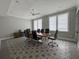 Bright conference room with a modern table, comfortable chairs, and plenty of natural light at 6711 Cadence Blvd, Atlanta, GA 30328