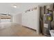 Spacious garage with white storage cabinets and a water heater at 6711 Cadence Blvd, Atlanta, GA 30328