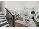 Inviting open-concept living space with large windows, modern finishes, and hardwood flooring at 6711 Cadence Blvd, Atlanta, GA 30328