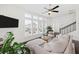 Light-filled living room featuring expansive windows, sleek finishes, and a modern aesthetic at 6711 Cadence Blvd, Atlanta, GA 30328