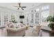 Bright living room boasts natural light, neutral decor, and a cozy seating arrangement at 6711 Cadence Blvd, Atlanta, GA 30328