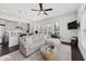 Stylish living area with integrated kitchen, perfect for entertaining and modern living at 6711 Cadence Blvd, Atlanta, GA 30328
