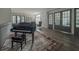 Elegant piano with rug inside a cozy lounge or lobby area at 6711 Cadence Blvd, Atlanta, GA 30328