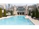 A sparkling outdoor pool with clear blue water provides a luxurious escape for residents at 6711 Cadence Blvd, Atlanta, GA 30328