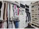 Walk-in closet with custom shelving and clothing racks for maximum storage and organization at 6711 Cadence Blvd, Atlanta, GA 30328