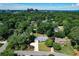 This is an aerial view of a beautiful neighborhood featuring mature trees and landscaped yards at 4824 Dunwoody Station Dr, Atlanta, GA 30338