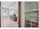 Walk-in closet with built-in shelving and plenty of storage and natural light at 4824 Dunwoody Station Dr, Atlanta, GA 30338