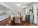 Elegant dining room with hardwood floors, neutral decor, and ample natural light at 4824 Dunwoody Station Dr, Atlanta, GA 30338