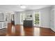 Dining room with wood floors, natural light, and traditional design at 4824 Dunwoody Station Dr, Atlanta, GA 30338