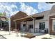 A welcoming exterior with colorful seating and a charming sign at 4824 Dunwoody Station Dr, Atlanta, GA 30338