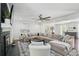 Spacious living room featuring hardwood floors, fireplace, and a comfortable seating area at 4824 Dunwoody Station Dr, Atlanta, GA 30338