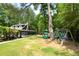 A fun community playground with a swingset and slide for children at 4824 Dunwoody Station Dr, Atlanta, GA 30338