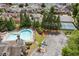 Aerial view of the community pool, tennis courts, and surrounding homes at 620 Stickley Oak Way, Woodstock, GA 30189