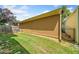 View of the side yard with a grassy lawn and fencing at 620 Stickley Oak Way, Woodstock, GA 30189
