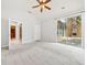 Bright and spacious bedroom with large windows and plush carpeting at 620 Stickley Oak Way, Woodstock, GA 30189