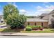 Charming home exterior with well-maintained landscaping and a manicured lawn at 620 Stickley Oak Way, Woodstock, GA 30189
