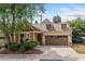 Charming home with a two-car garage and well-manicured landscaping at 620 Stickley Oak Way, Woodstock, GA 30189