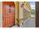 Close up of the front door with a detailed knocker and sidelight at 620 Stickley Oak Way, Woodstock, GA 30189