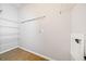 Practical laundry room features shelving and necessary connections for appliances at 620 Stickley Oak Way, Woodstock, GA 30189