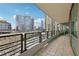 Large private balcony offers stunning views of the city skyline at 700 Park Regency Ne Pl # 1203, Atlanta, GA 30326